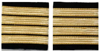 Paire d’épaulettes de commandant de bord, quatre galons dorés sur fond noir